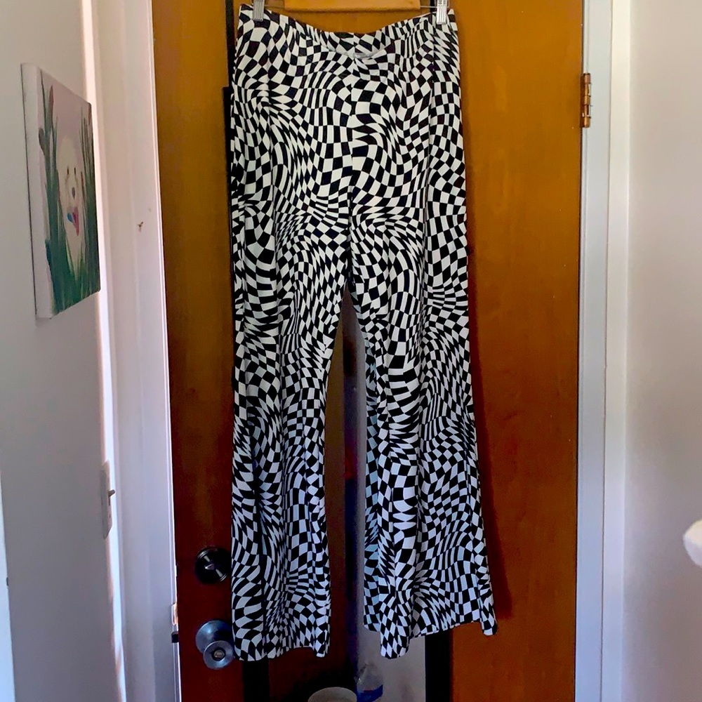 Checkered bell bottom leggings.